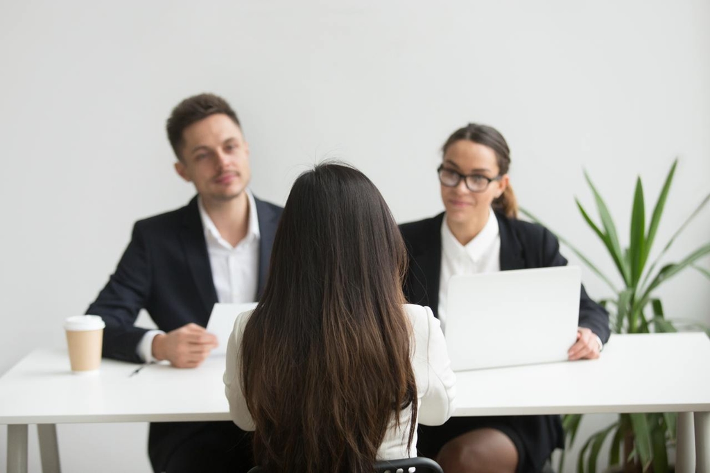 Professional preparing for job interview with notes